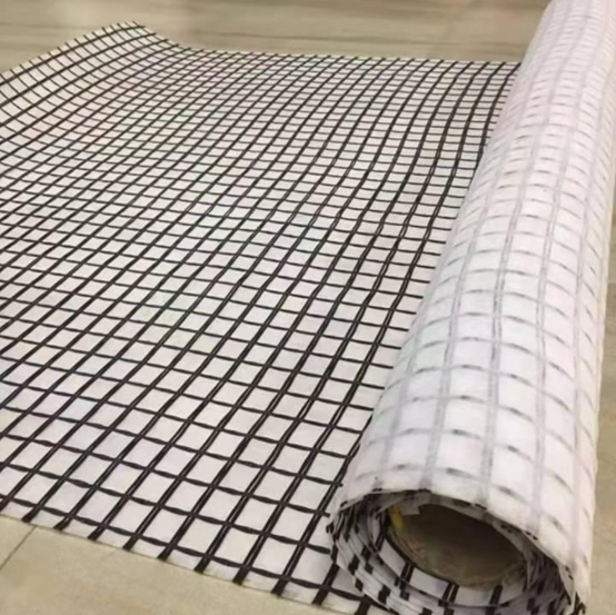 Warp-knitted polyester geogrid composite geotextiles